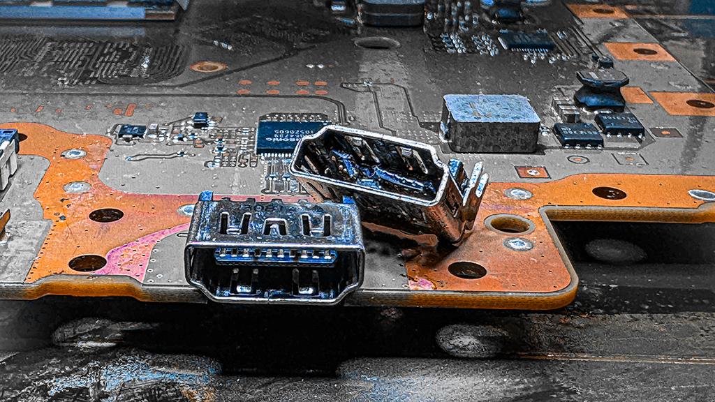PS5 HDMI-Port Reparatur in Erfurt: HDMI-Buchse und Signalchip auf dem PlayStation-5-Mainboard in der SmartDoc-Werkstatt